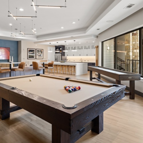 a clubroom with a pool table